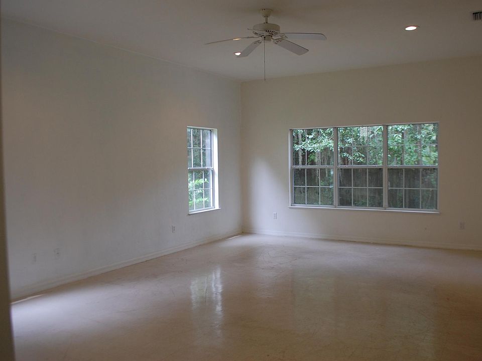Huge living room. with storage under the stairs