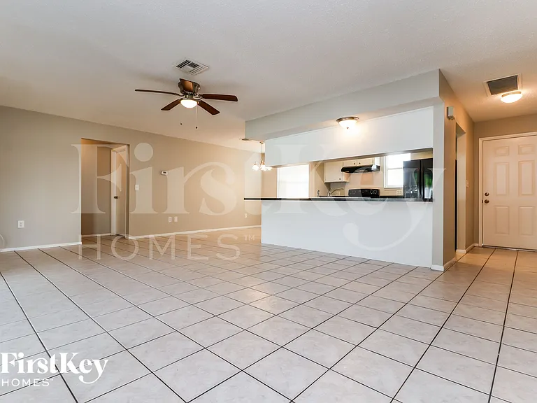7704 Riverdale Dr — Photo 2