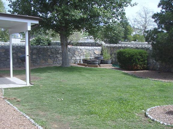 Backyard (fenced with dog run-left side of house)