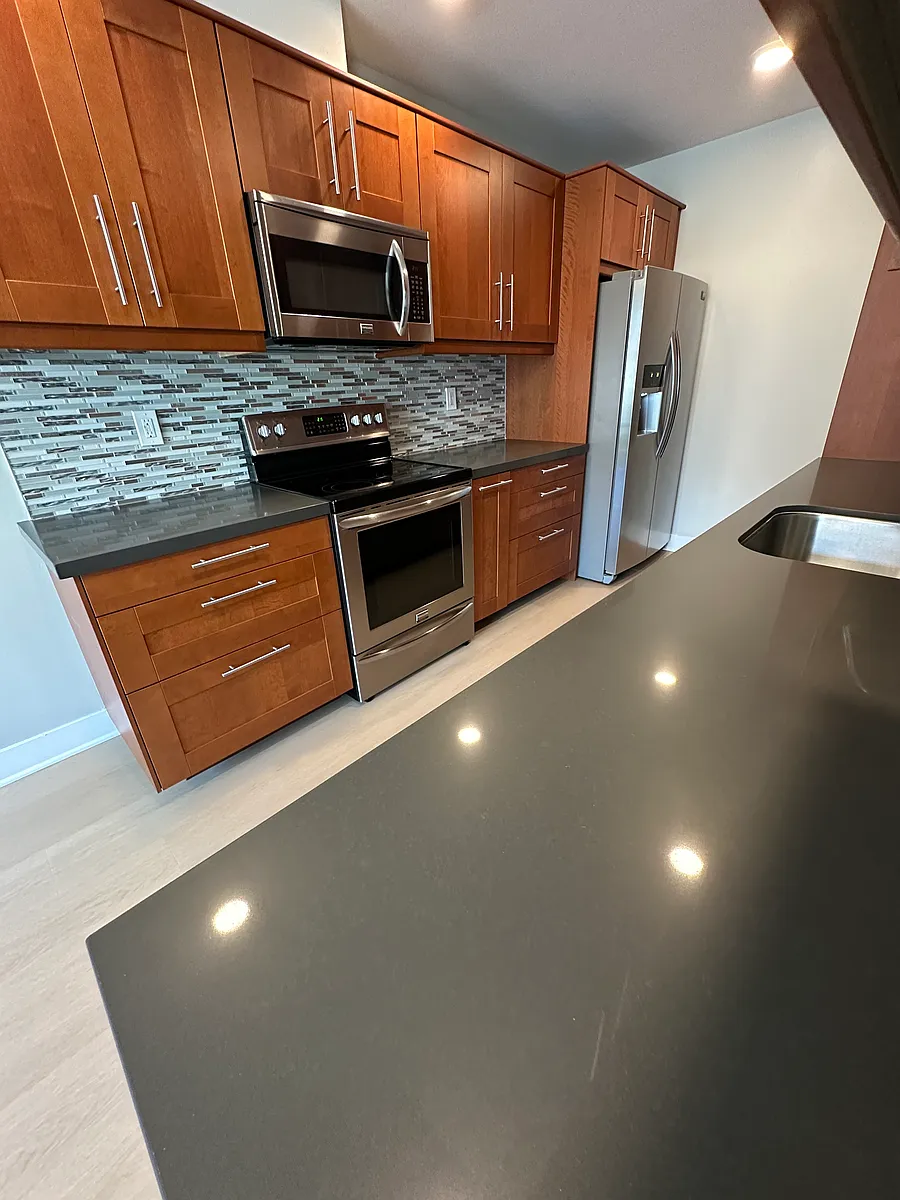 Kitchen Left; Stove, Microwave, Fridge with Water/Ice in door. - 2353 Albatross St #205