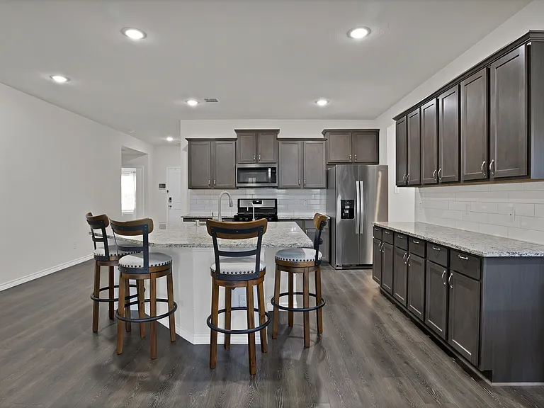 Kitchen view from dining and living area