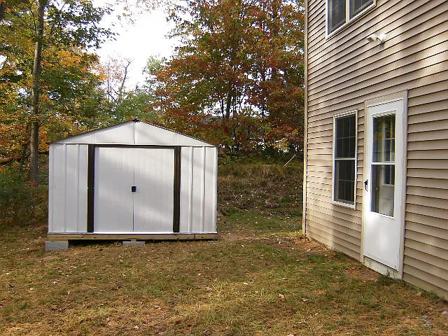 Storage shed for tenant use, in back yard