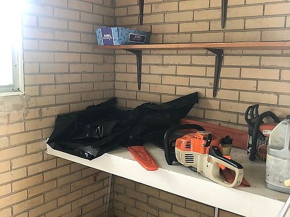 Storage room in carport