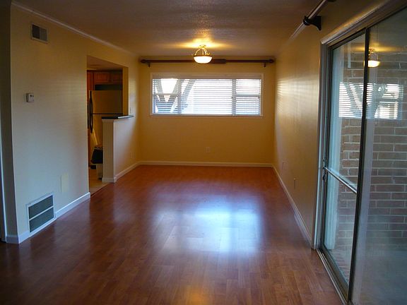 Family and dinning area with new hardwood floor