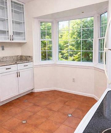 Eat-in kitchen with tile floors, granite countertops