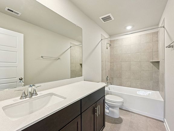 The Ian floorplan in Stewart apos s Ranch of Conroe, TX.