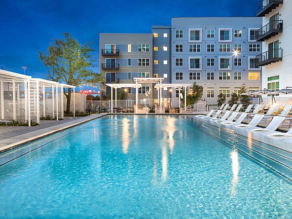 Relax by the pool as the evening sets in, perfect for unwinding after a long day.