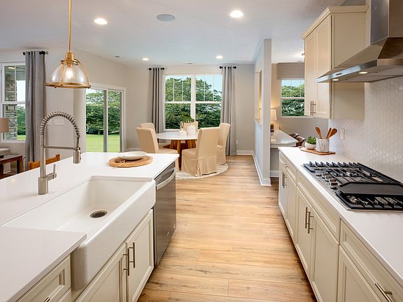 Kitchen with Center Island and Built-in Appliances