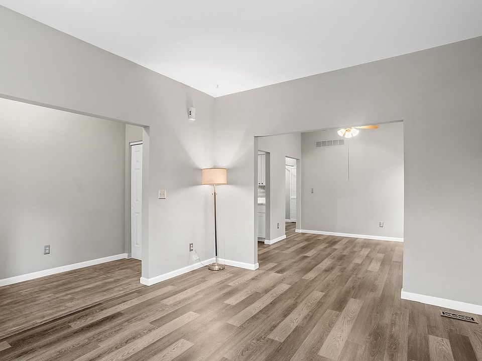 Entry with closet; living room; dining room; unit is in the Central West End