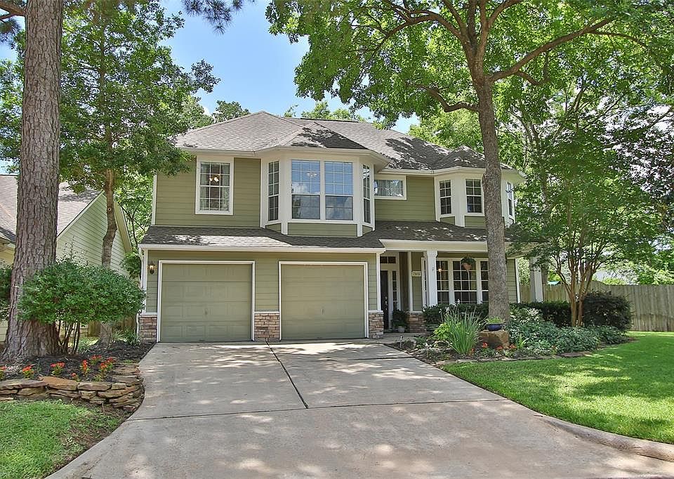 Stunning 2-Story David Weekley Home Beautifully Situated on a 11,854 SF Cul-De-Sac Lot in Gated Section of the Upscale Neighborhood of Woodwind Lakes!