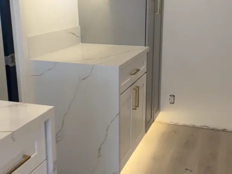 Quartz countertops with waterfall on every edge