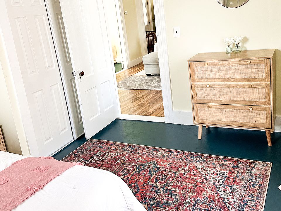 Bedroom 1 with dresser and closet space