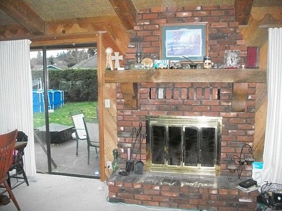 Fireplace and backyard