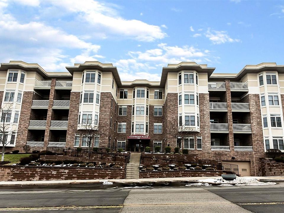 Exquisite 2 bedroom, 2 bath end unit condo located on the top floor in sought after Claymont Condo.