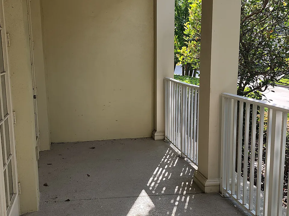 Wraparound porch, on the Virginia Dr side of the condo.