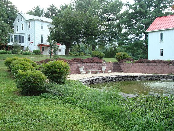 Pond w/fountain and lighting