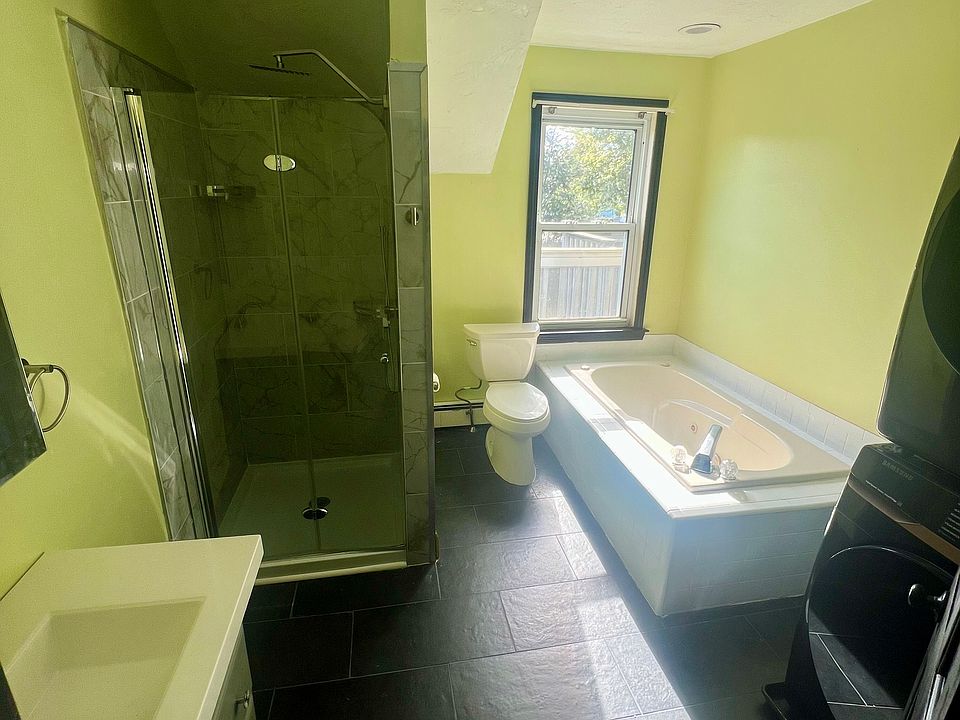 Renovated Bathroom with standing shower & tub