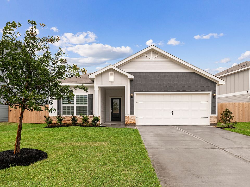 This single story home has a professionally landscaped yard
