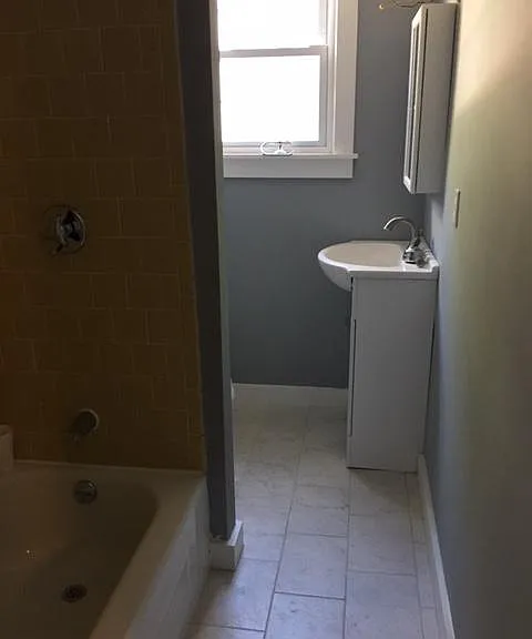 full bath with tub