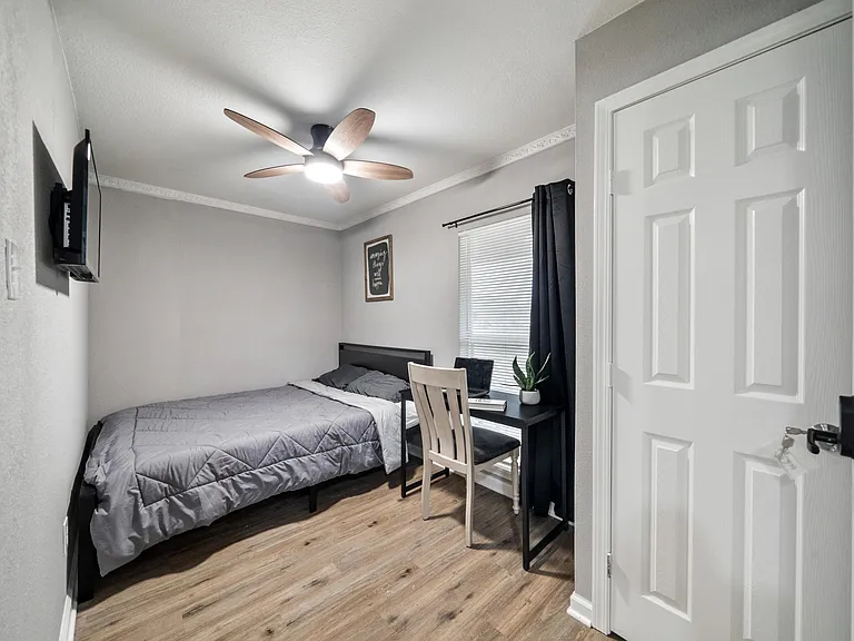 Queen Bed, Desk, Smart TV, Seating, Closet