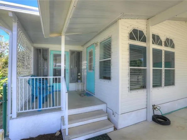 295 Papaya Cir, Barefoot Bay, FL 32976