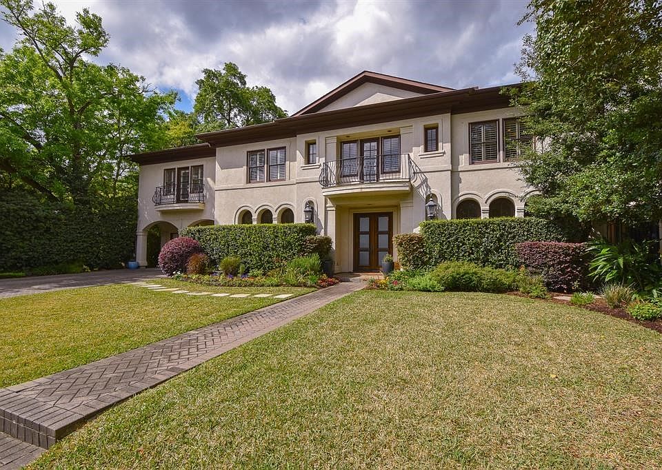 #6 Bash Place is located just off Mid Lane. Gorgeous landscaping makes the curb appeal on this home sparkle.