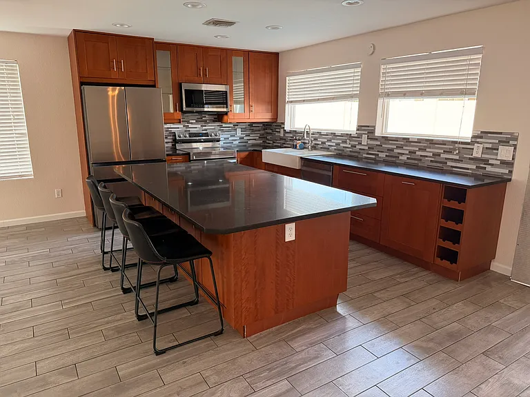Kitchen, with large island and chairs