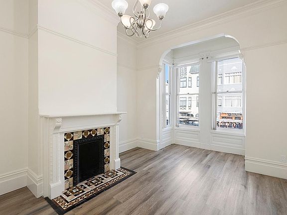Living room- decorative fireplace and street view