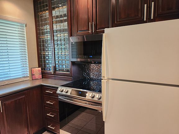 4th image of 5756 S Waterbury Way Unit E