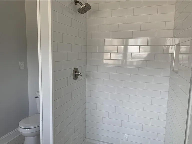 Large primary bedroom bathroom