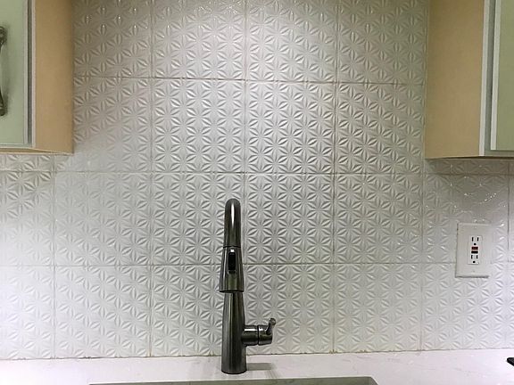 Full-sized kitchen sink with garbage disposal