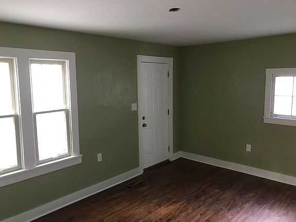 Living room with front door.