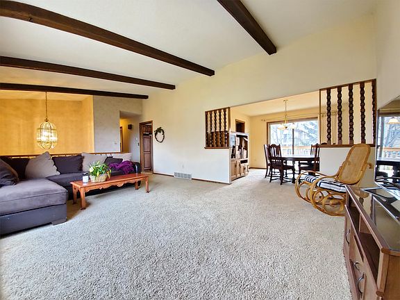 Open floor plan with vaulted ceiling allows for plenty natural light
