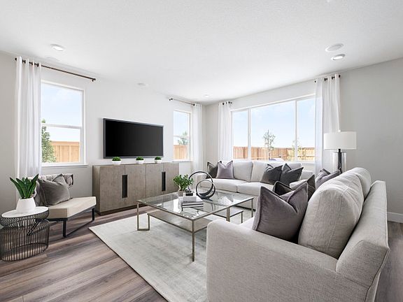 Gathering room opens to kitchen