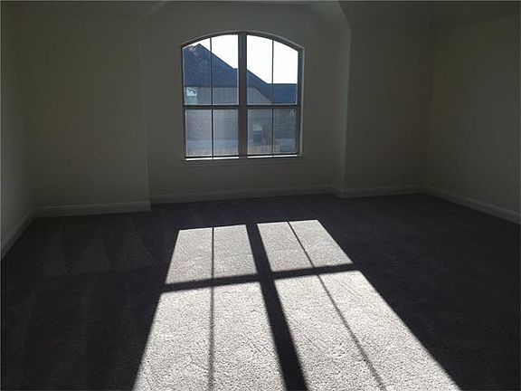 Photo of similar home further along in construction process. Actual home under construction.