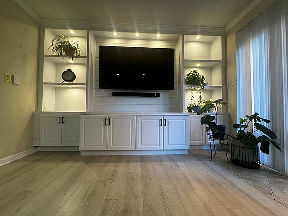 This is so much storage! The TV & Sound bar can stay for renters use.