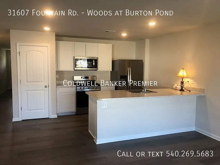 31607 Fountain Rd #WOODS AT BURTON POND — Photo 4