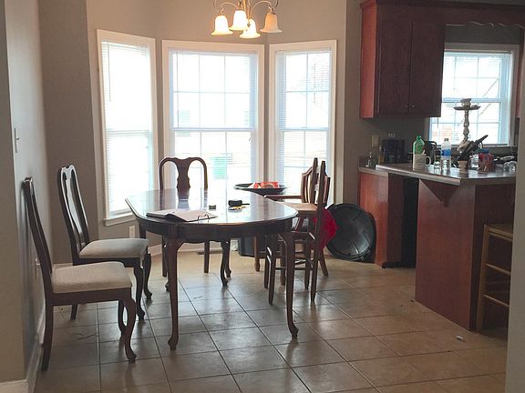 View of Dining room from the living room next to the kitchen.
 __