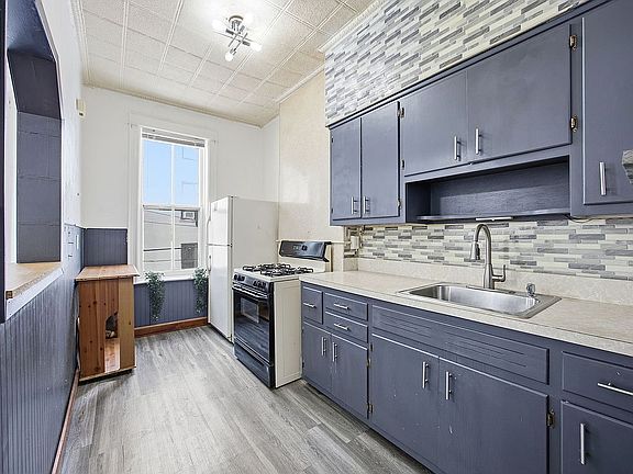 5th image of 60-67 Putnam Ave #2FAM