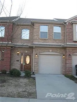 Custom townhome located in a quiet cul-de-sac.