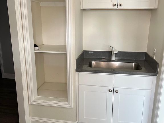 Sink and Cabinets in Laundry Room