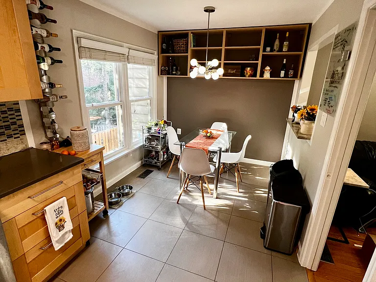 Dining Room FURNISHED: w/ dining table, chairs, & wine rack