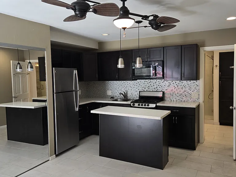 Another View of the Kitchen Are with Island Work Station