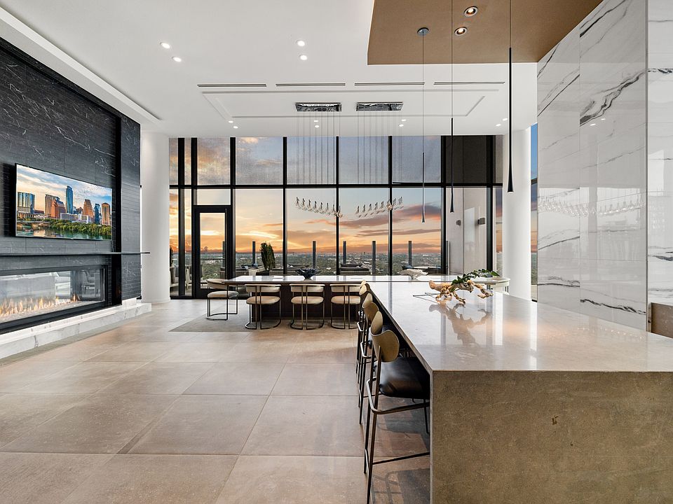 Resident entertaining lounge with ample seating and city views