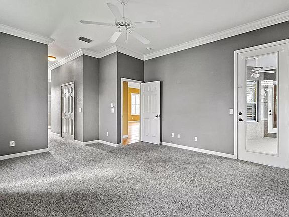 Master Bedroom, Twin Walk-in closets, Door to Patio