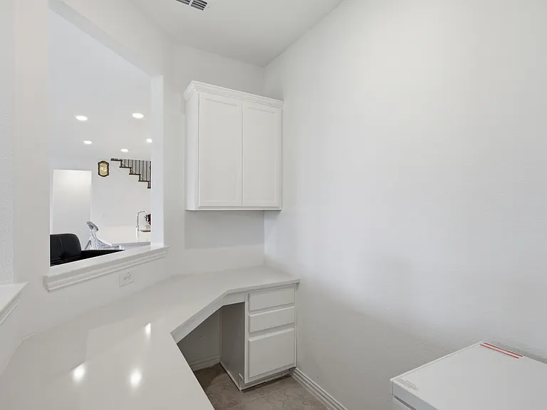 Built-in desk off Dining Area. Ideally for kids homework area or crafting.