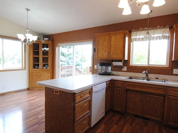 Great open kitchen with corner built in in the dining area.