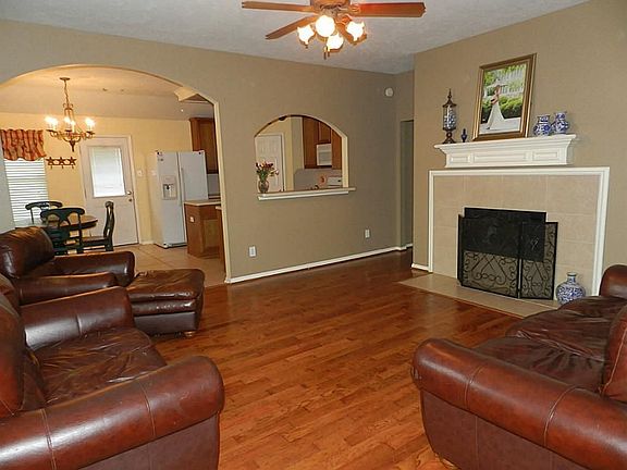 Spacious Family Room Accented by A Gas/Log Fireplace.