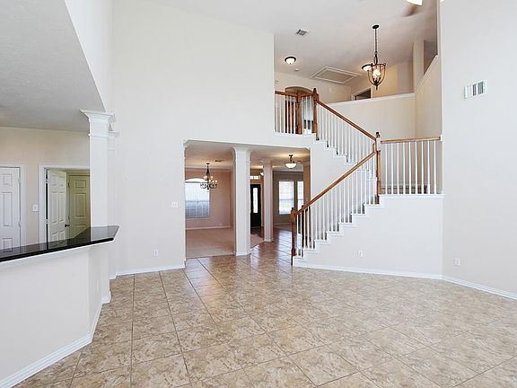 High ceilings in the family room with tile floors.
