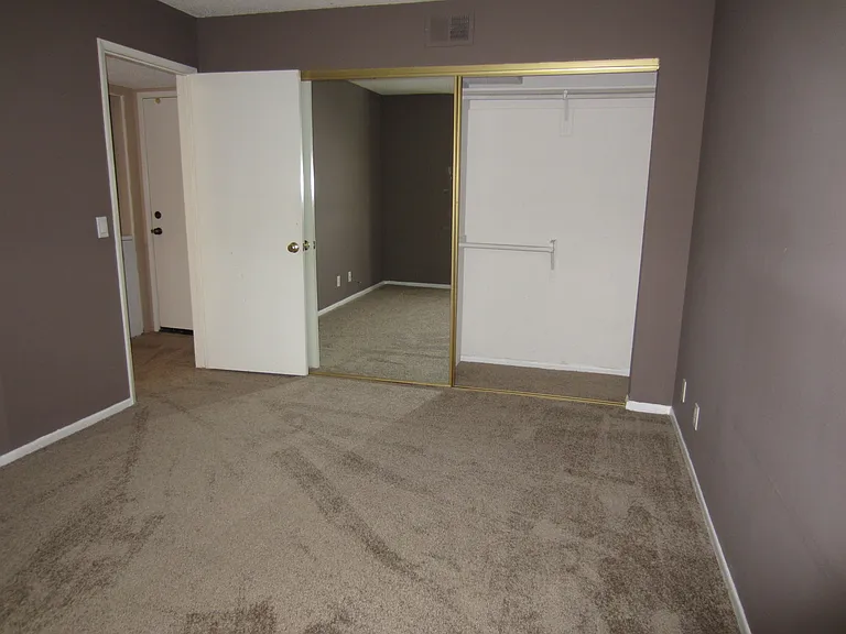 Upstairs bedroom with closet